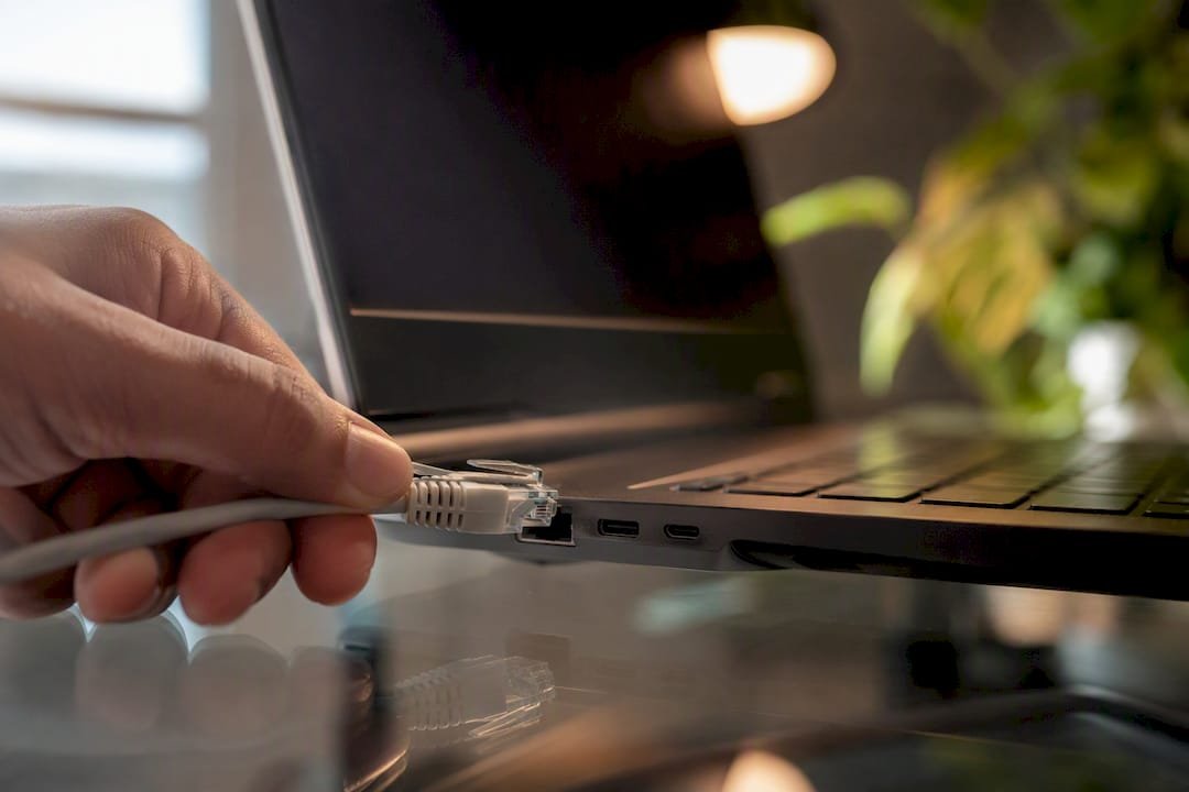 Ethernet cable plugged into laptop port