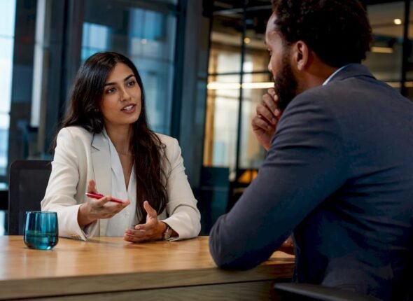 Professionals conducting a focused negotiation