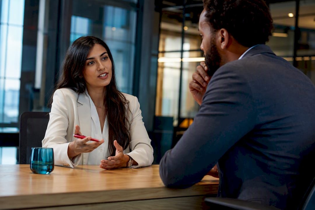 Professionals conducting a focused negotiation