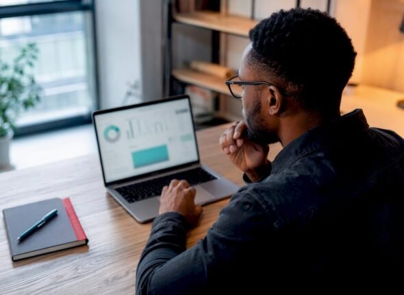 Professional studying a digital marketing dashboard