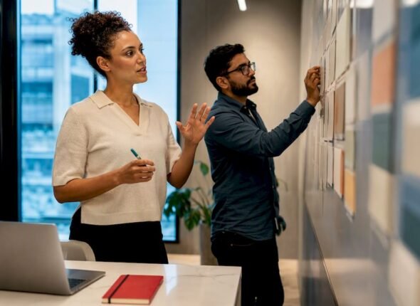 Professionals coordinating an Agile delivery session