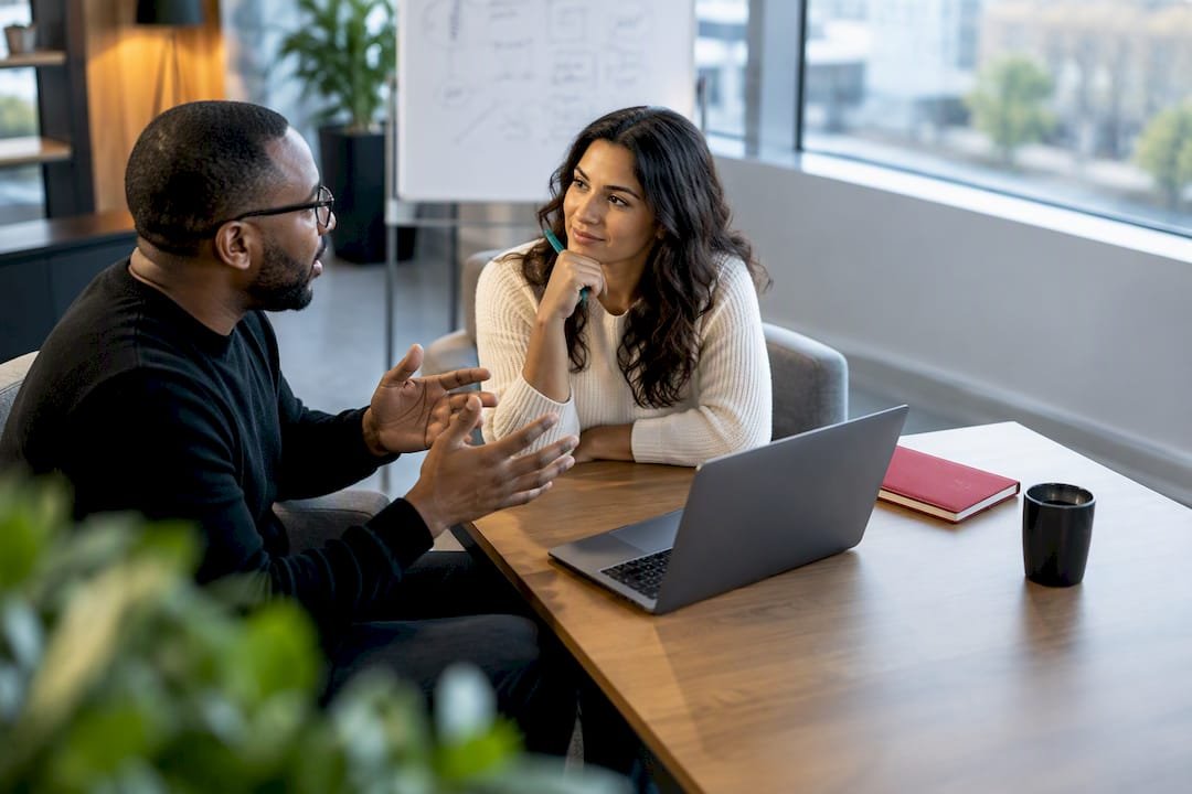 Agile coach guiding a workplace conversation