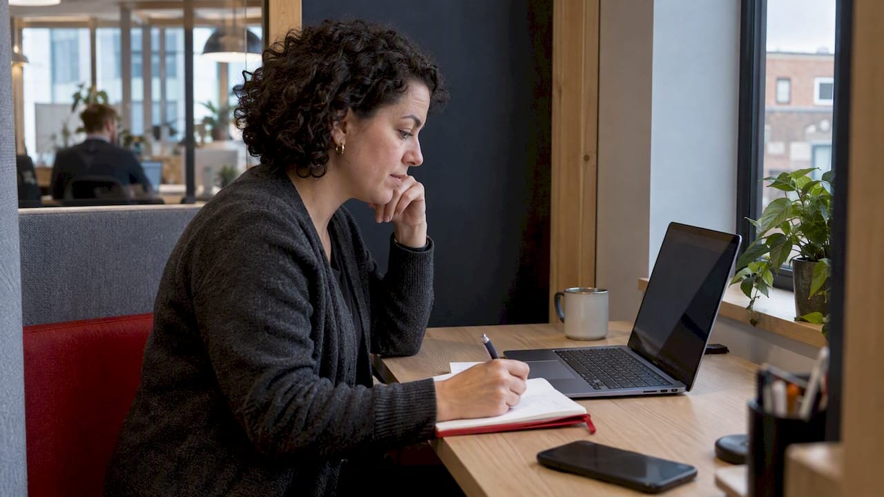 Professional reviewing an online exam policy