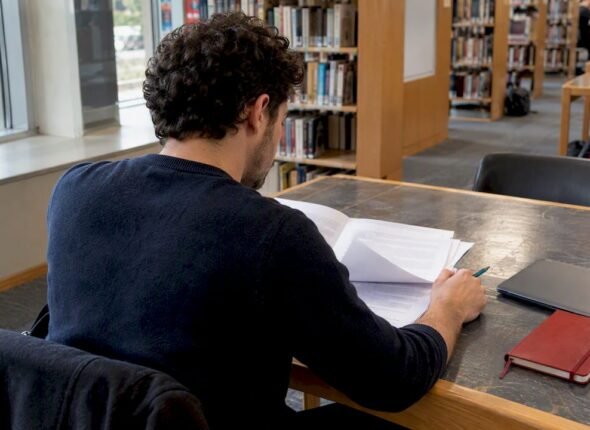 Adult preparing for sales certification exam