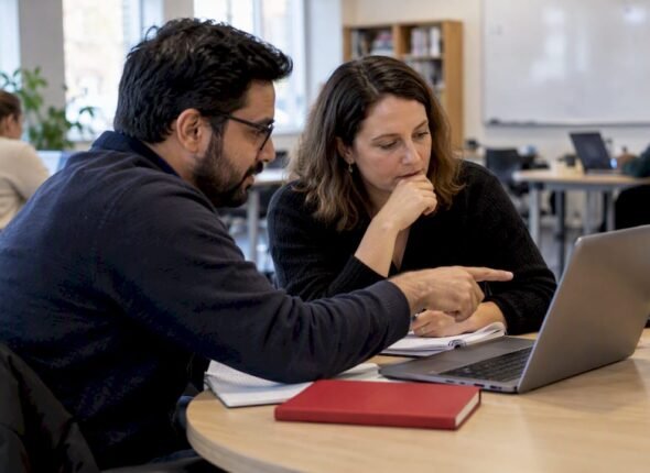 Professionals comparing OKR certification pathways
