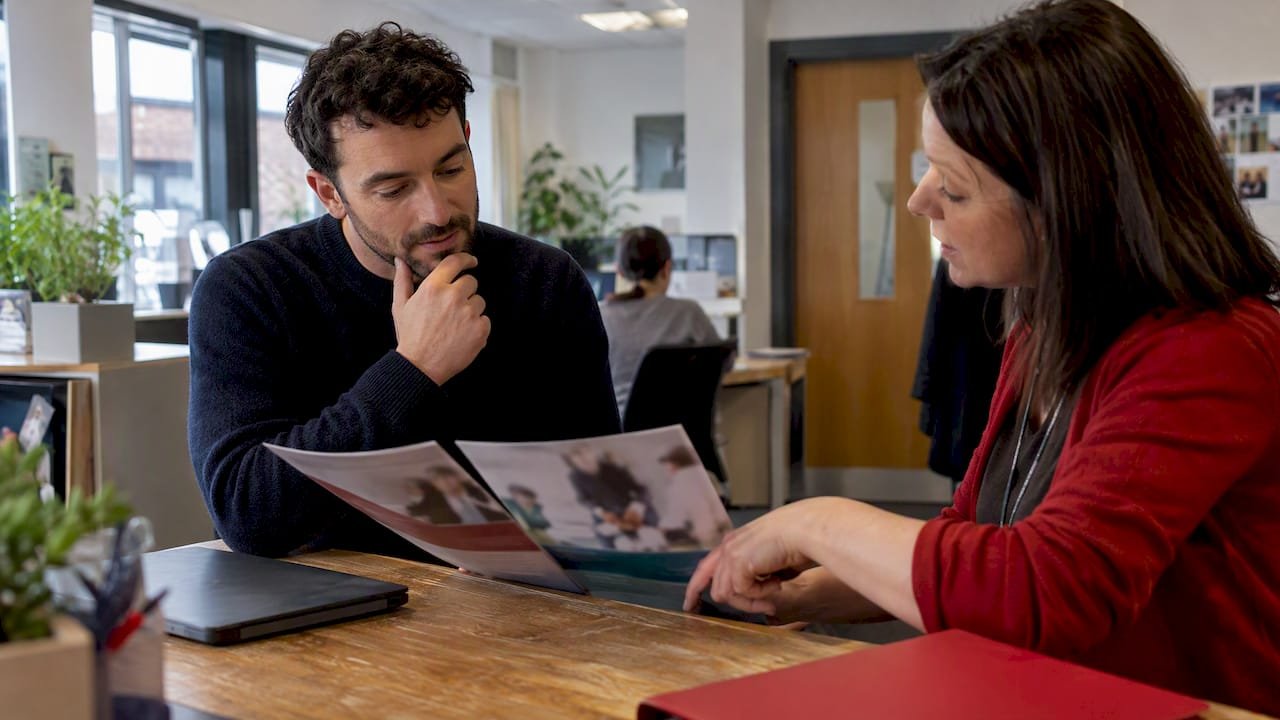 Marketer comparing professional course options