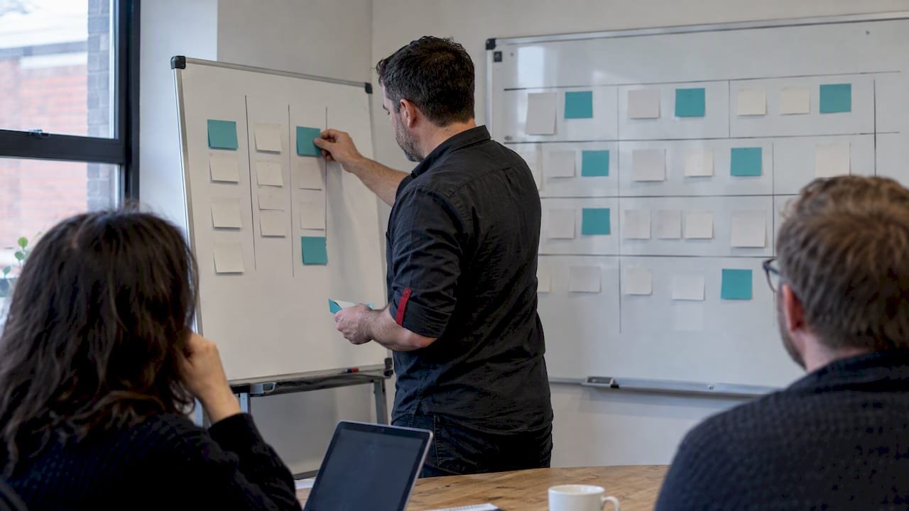 Agile lead comparing two framework planning boards