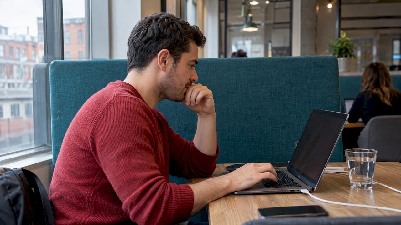 Career switcher reviewing an SPOC voucher