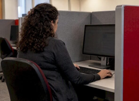 Candidate taking a computer-based certification exam